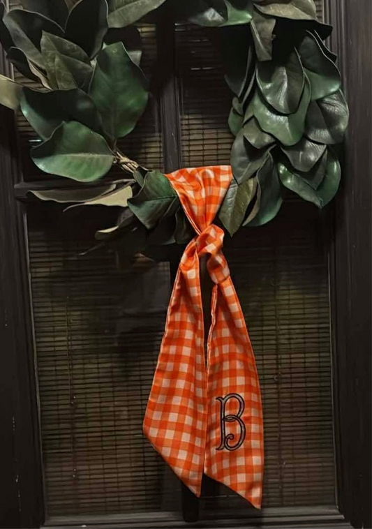 Printed orange sash & initial
